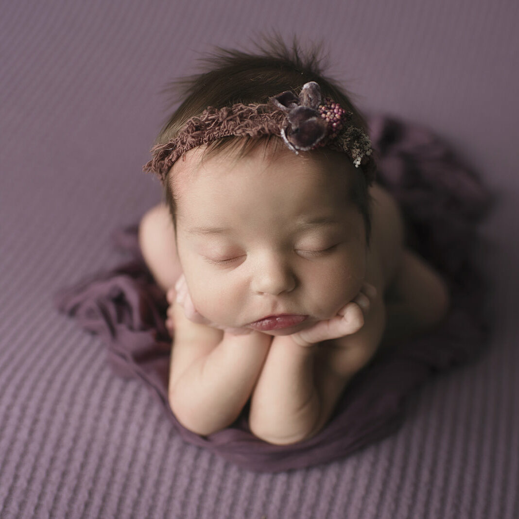 Tulsa newborn girl in purple